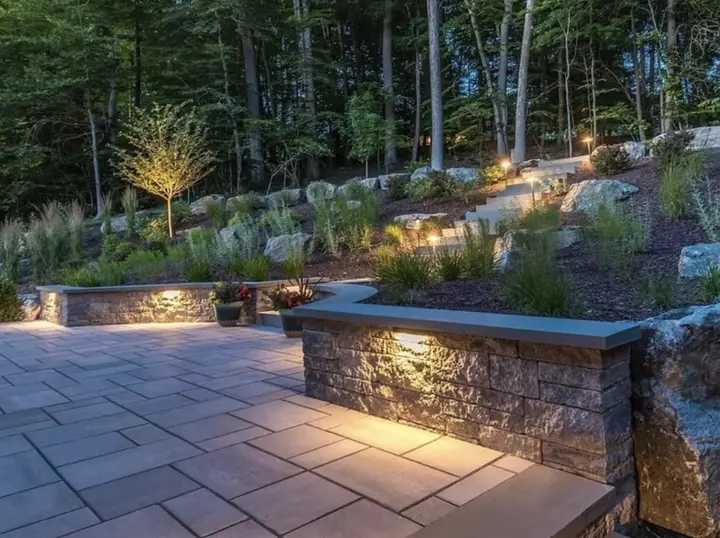 LED path and step lighting along an evening walkway